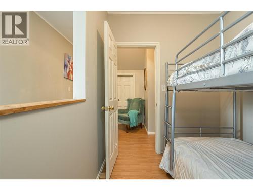 7704 97A Highway, Mara, BC - Indoor Photo Showing Bedroom