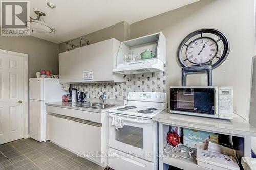 9D - 67 Caroline Street S, Hamilton, ON - Indoor Photo Showing Kitchen With Double Sink