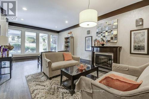 9D - 67 Caroline Street S, Hamilton, ON - Indoor Photo Showing Living Room With Fireplace