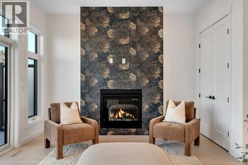 2436 30 Avenue Sw, Calgary, AB - Indoor Photo Showing Living Room With Fireplace