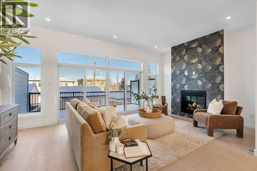 2436 30 Avenue Sw, Calgary, AB - Indoor Photo Showing Living Room With Fireplace