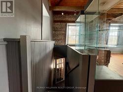 Back staircase lading to main floor. - 