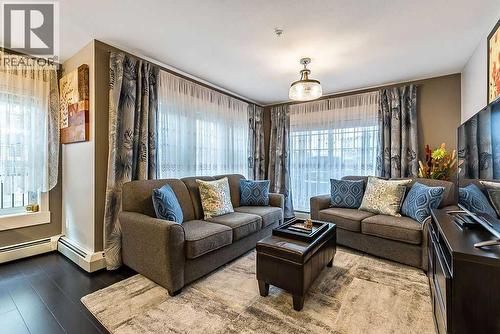 2114, 11 Mahogany Row Se, Calgary, AB - Indoor Photo Showing Living Room