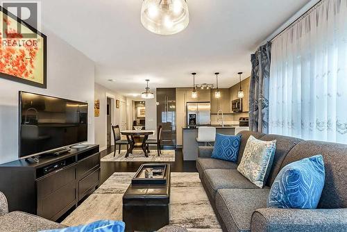 2114, 11 Mahogany Row Se, Calgary, AB - Indoor Photo Showing Living Room
