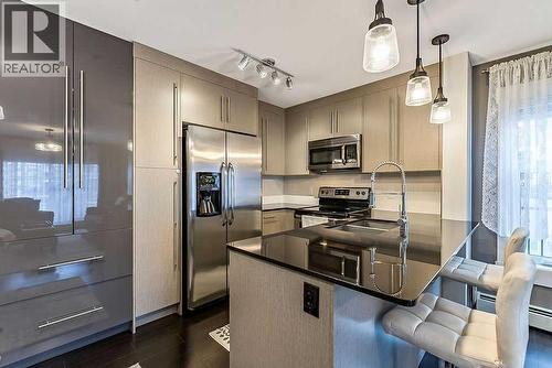 2114, 11 Mahogany Row Se, Calgary, AB - Indoor Photo Showing Kitchen With Double Sink