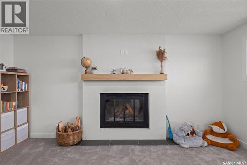 3103 Grey Owl Crescent, Prince Albert, SK - Indoor Photo Showing Other Room With Fireplace