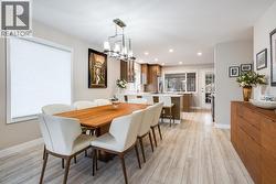 Open dining space ideal for hosting family and friends. - 