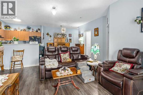 1116, 1140 Taradale Drive Ne, Calgary, AB - Indoor Photo Showing Living Room
