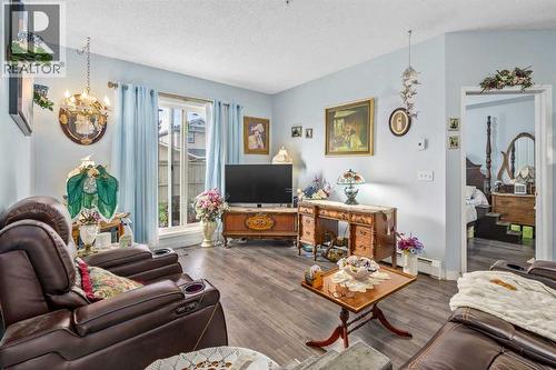 1116, 1140 Taradale Drive Ne, Calgary, AB - Indoor Photo Showing Living Room