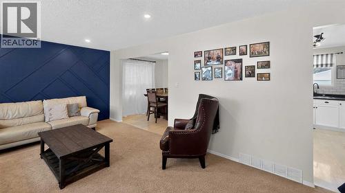 5813 50 Street, Taber, AB - Indoor Photo Showing Living Room