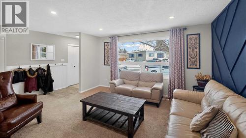 5813 50 Street, Taber, AB - Indoor Photo Showing Living Room