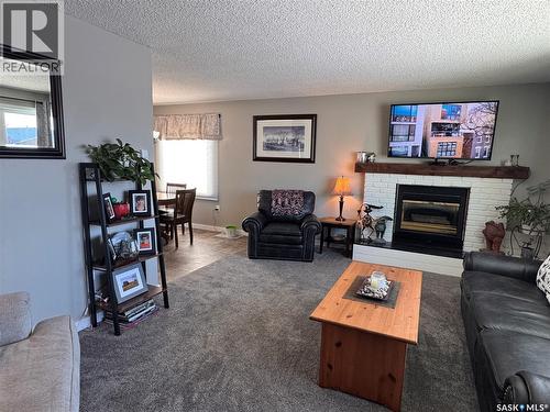 415 3Rd Avenue W, Biggar, SK - Indoor Photo Showing Living Room With Fireplace