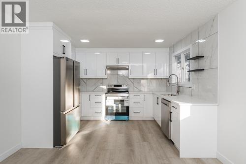 7790 Queens Crescent, Prince George, BC - Indoor Photo Showing Kitchen With Upgraded Kitchen