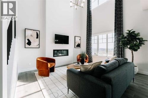 432 Ranch Gate, Strathmore, AB - Indoor With Fireplace