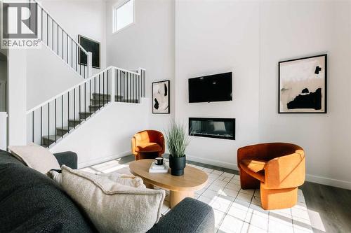 432 Ranch Gate, Strathmore, AB - Indoor Photo Showing Living Room With Fireplace