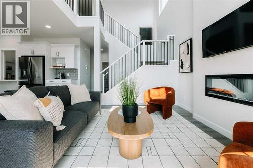 432 Ranch Gate, Strathmore, AB - Indoor Photo Showing Living Room With Fireplace