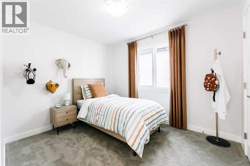 432 Ranch Gate, Strathmore, AB - Indoor Photo Showing Bedroom