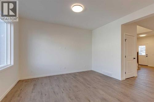 1379 Bayview Crescent Sw, Airdrie, AB - Indoor Photo Showing Other Room