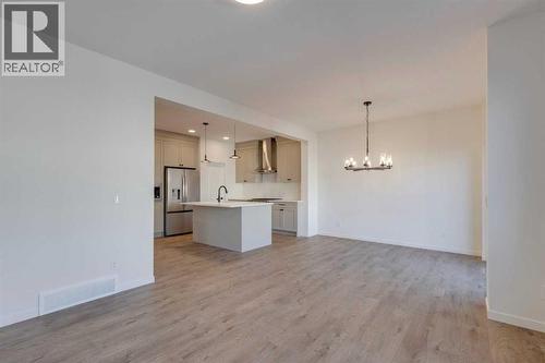 1379 Bayview Crescent Sw, Airdrie, AB - Indoor Photo Showing Kitchen