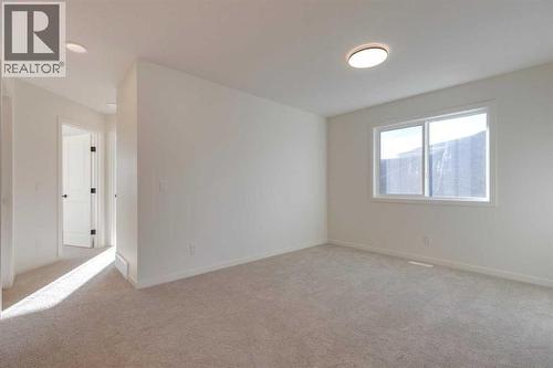 1379 Bayview Crescent Sw, Airdrie, AB - Indoor Photo Showing Other Room
