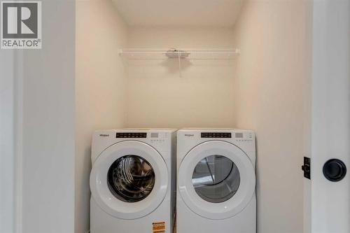 1379 Bayview Crescent Sw, Airdrie, AB - Indoor Photo Showing Laundry Room