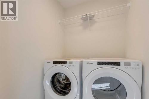 1379 Bayview Crescent Sw, Airdrie, AB - Indoor Photo Showing Laundry Room