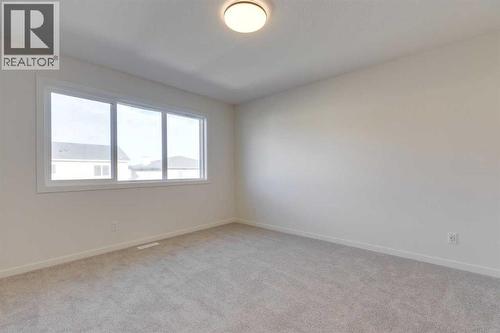 1379 Bayview Crescent Sw, Airdrie, AB - Indoor Photo Showing Other Room