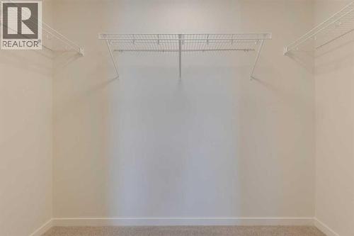 1379 Bayview Crescent Sw, Airdrie, AB - Indoor With Storage