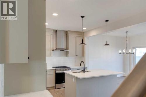 1379 Bayview Crescent Sw, Airdrie, AB - Indoor Photo Showing Kitchen With Upgraded Kitchen
