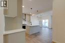1379 Bayview Crescent Sw, Airdrie, AB  - Indoor Photo Showing Kitchen 