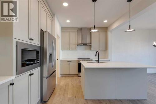 1379 Bayview Crescent Sw, Airdrie, AB - Indoor Photo Showing Kitchen With Upgraded Kitchen