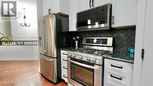 8245 102 Avenue, Peace River, AB - Indoor Photo Showing Kitchen