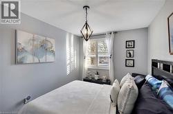 Bedroom featuring a textured ceiling - 