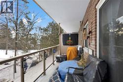 View of snow covered back of property - 