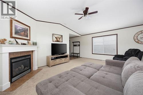 328 Grey Crescent, Fort Mcmurray, AB - Indoor Photo Showing Living Room With Fireplace