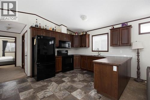 328 Grey Crescent, Fort Mcmurray, AB - Indoor Photo Showing Kitchen With Double Sink