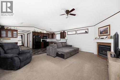 328 Grey Crescent, Fort Mcmurray, AB - Indoor Photo Showing Living Room With Fireplace