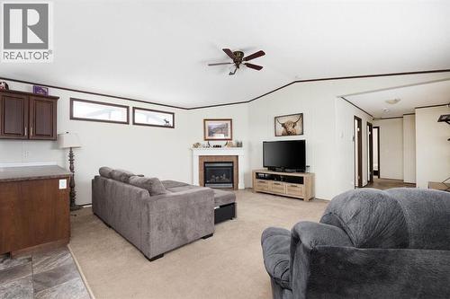 328 Grey Crescent, Fort Mcmurray, AB - Indoor Photo Showing Living Room With Fireplace