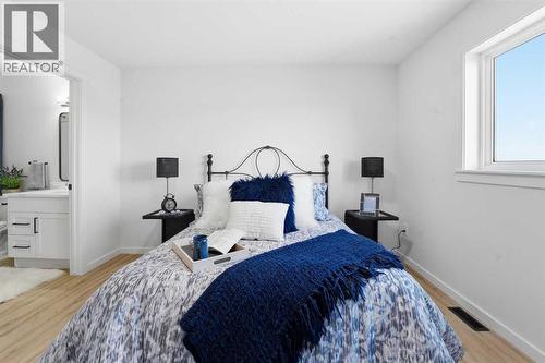 6 Metcalf Way, Lacombe, AB - Indoor Photo Showing Bedroom