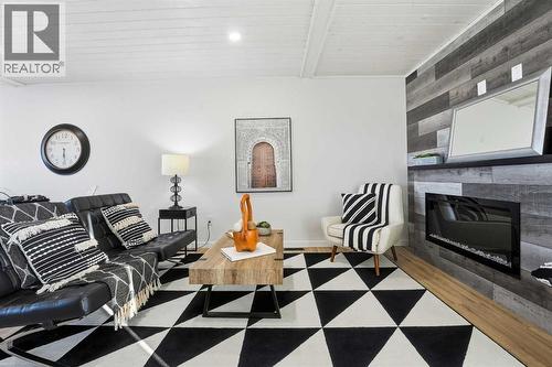 6 Metcalf Way, Lacombe, AB - Indoor With Fireplace