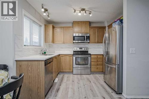 222 Bridleridge Way Sw, Calgary, AB - Indoor Photo Showing Kitchen
