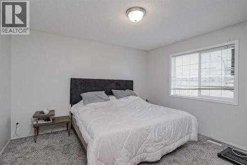 222 Bridleridge Way Sw, Calgary, AB - Indoor Photo Showing Bedroom