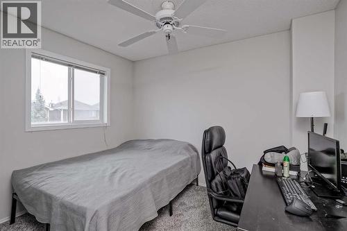 222 Bridleridge Way Sw, Calgary, AB - Indoor Photo Showing Bedroom