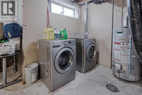 222 Bridleridge Way Sw, Calgary, AB - Indoor Photo Showing Laundry Room