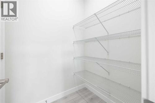 17 Sora Gardens Se, Calgary, AB - Indoor With Storage