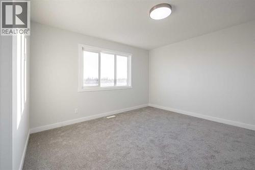 17 Sora Gardens Se, Calgary, AB - Indoor Photo Showing Other Room