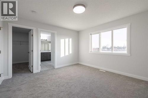 17 Sora Gardens Se, Calgary, AB - Indoor Photo Showing Other Room