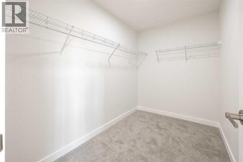 17 Sora Gardens Se, Calgary, AB - Indoor With Storage