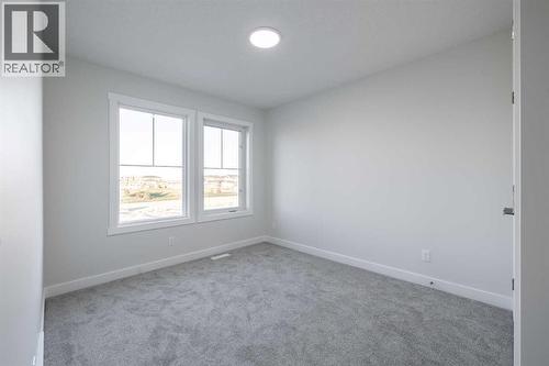 17 Sora Gardens Se, Calgary, AB - Indoor Photo Showing Other Room
