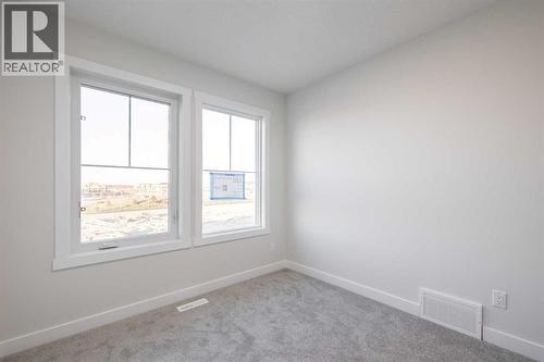 17 Sora Gardens Se, Calgary, AB - Indoor Photo Showing Other Room